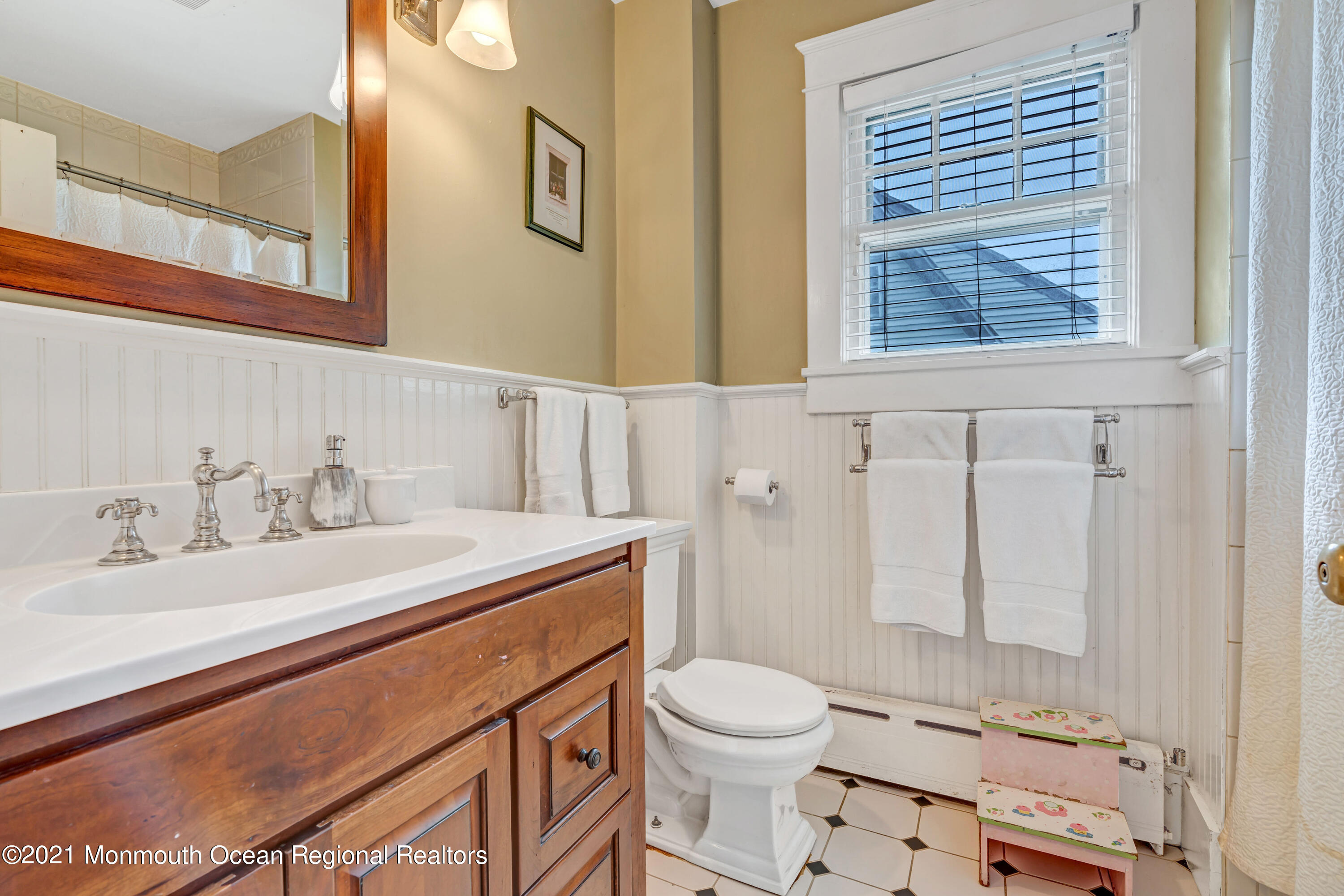119 Pinckney Road Little Silver, NJ 07739 - Photo 31 of 40 a bathroom with a sink a toilet and shower