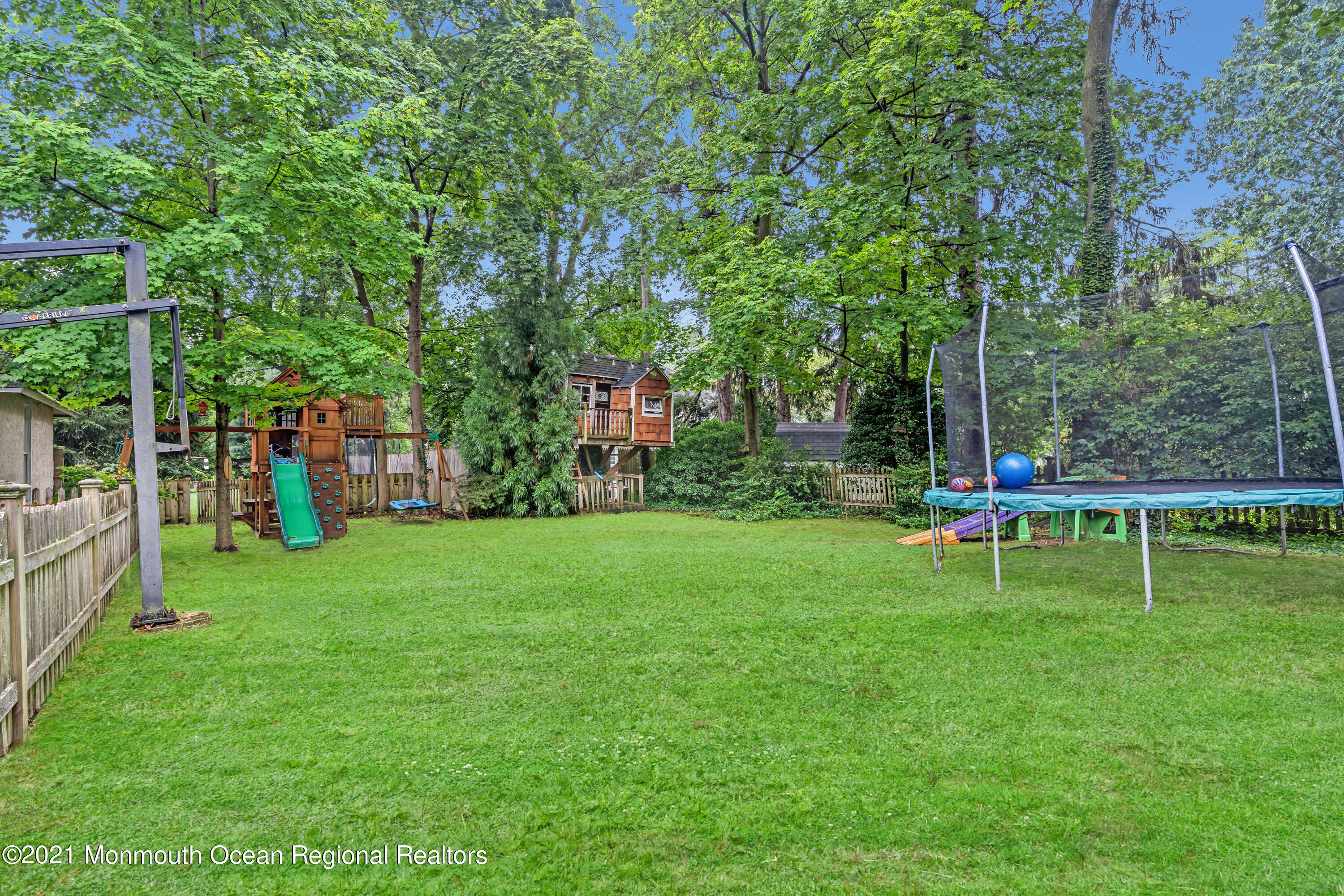119 Pinckney Road Little Silver, NJ 07739 - Photo 33 of 40 a view of a park with trees and wooden fence