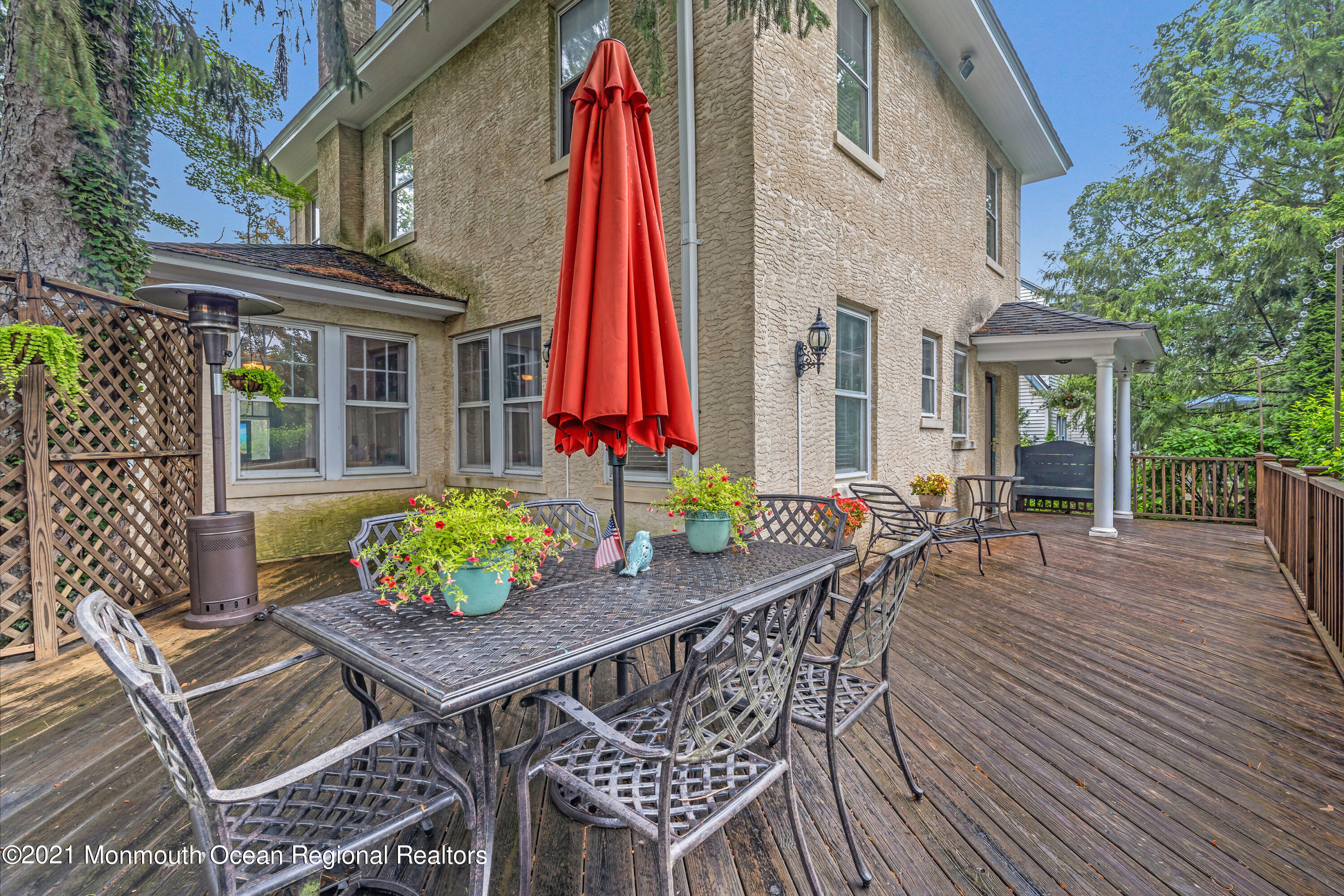 119 Pinckney Road Little Silver, NJ 07739 - Photo 34 of 40 a view of a dinning table and chairs in patio
