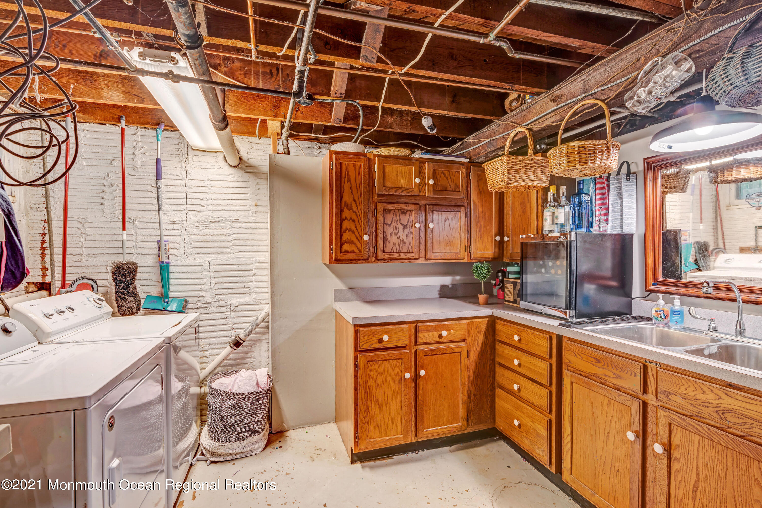 119 Pinckney Road Little Silver, NJ 07739 - Photo 40 of 40 a kitchen with a sink and cabinets