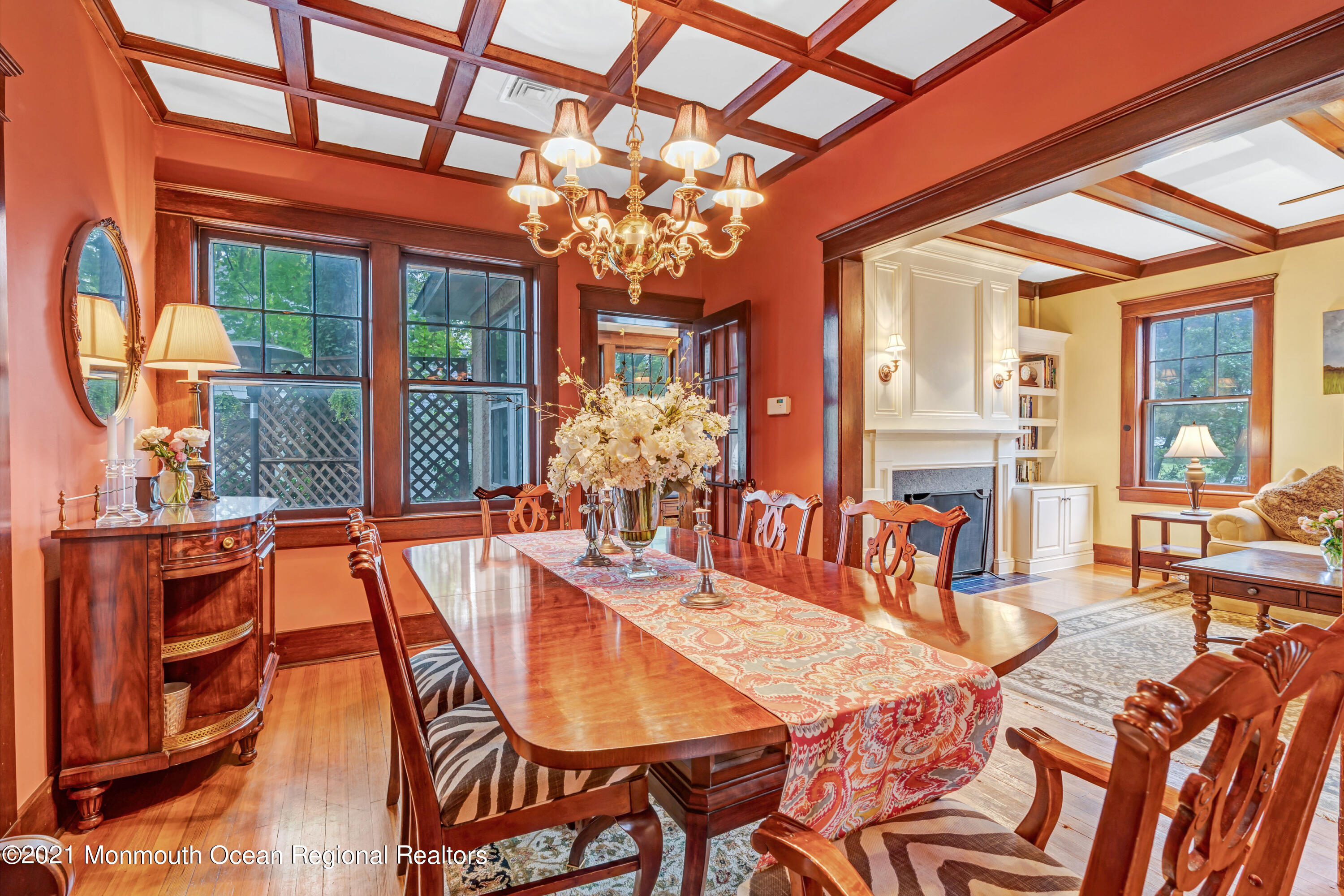 119 Pinckney Road Little Silver, NJ 07739 - Photo 10 of 40 a dining room with furniture a chandelier and wooden floor