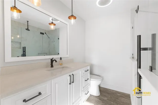 a bathroom with a shower and a shower