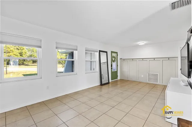 a view of a livingroom with furniture and furniture