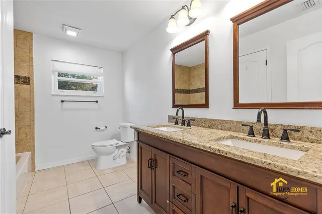 a bathroom with a shower and a bathtub