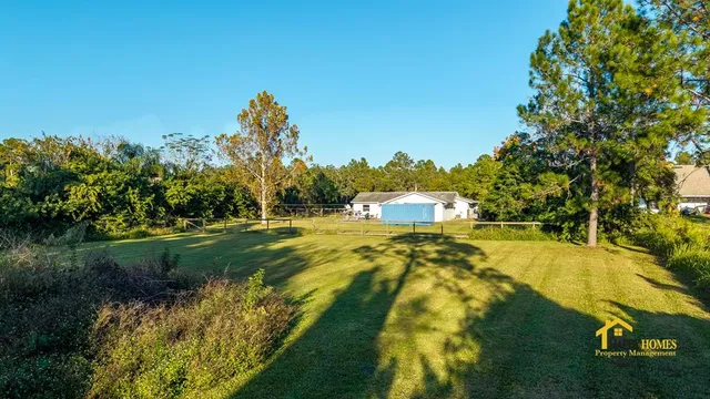 a view of a swimming pool with an ocean view