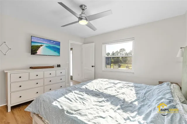 a view of walk in closet with clothes