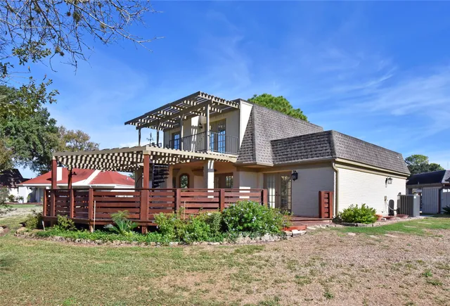 a view of a house with wooden walls