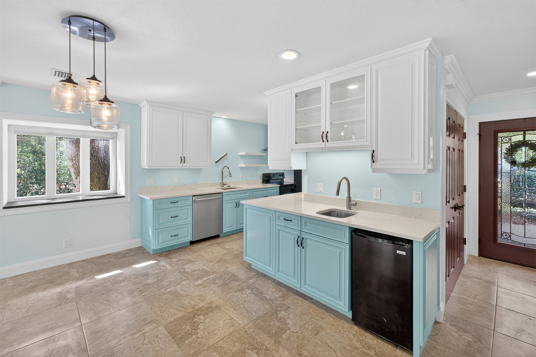 3301 Sea Marsh Road, Unit 3301 Amelia Island, FL 32034 - Photo 11 of 58 a kitchen with a sink stove and cabinets