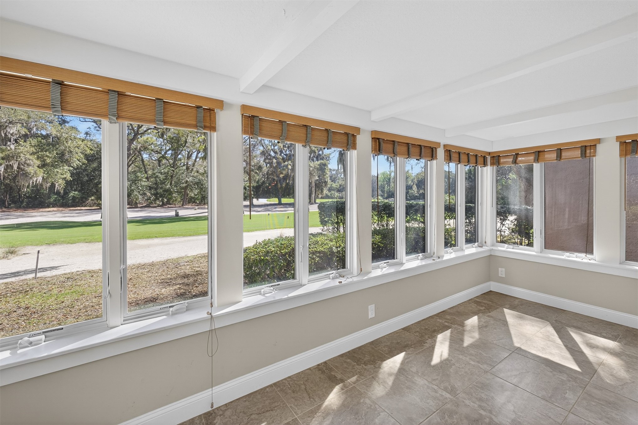 3301 Sea Marsh Road, Unit 3301 Amelia Island, FL 32034 - Photo 17 of 58 a view of an empty room with a large window