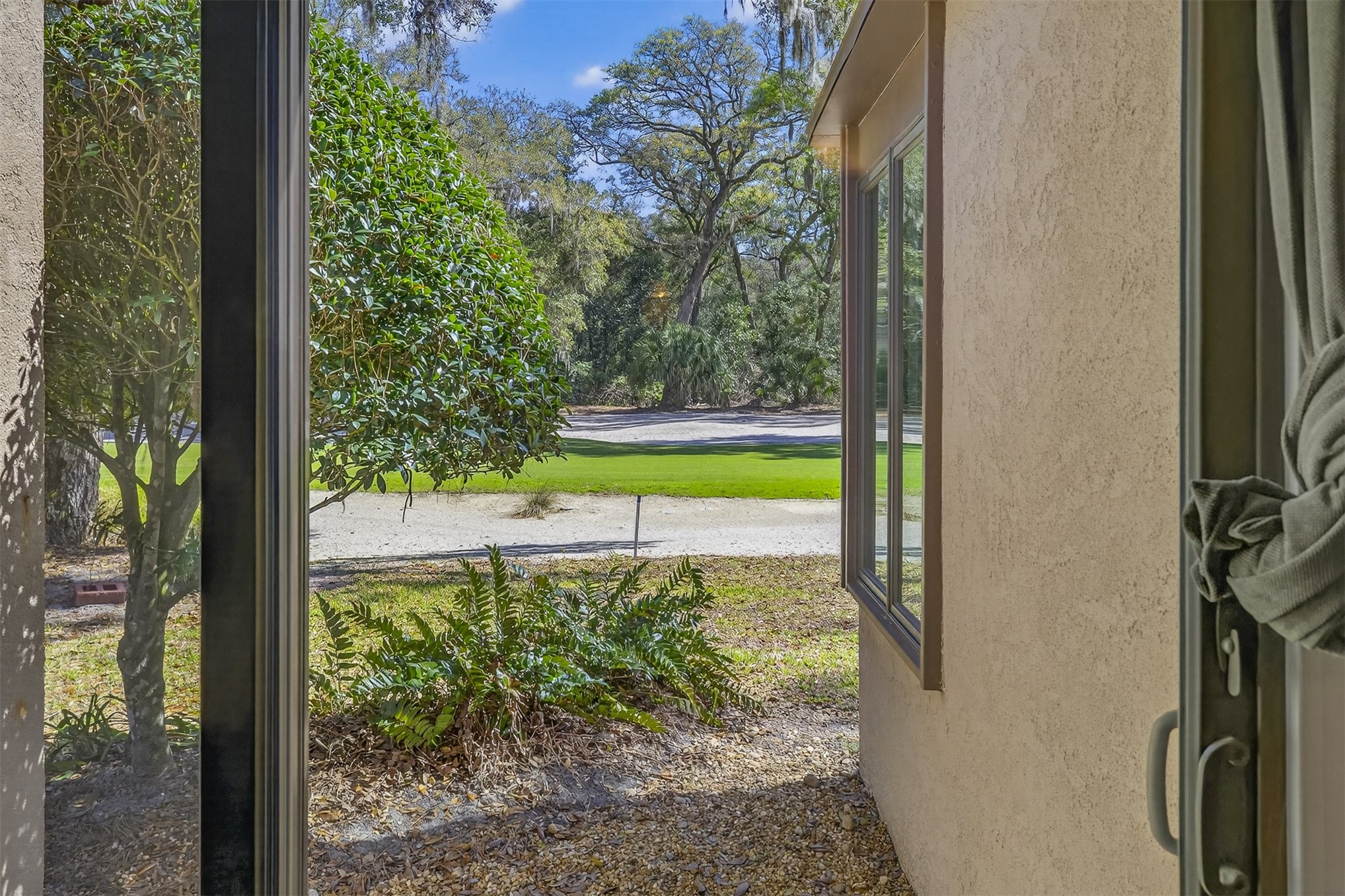 3301 Sea Marsh Road, Unit 3301 Amelia Island, FL 32034 - Photo 24 of 58 a view of a swimming pool from a window