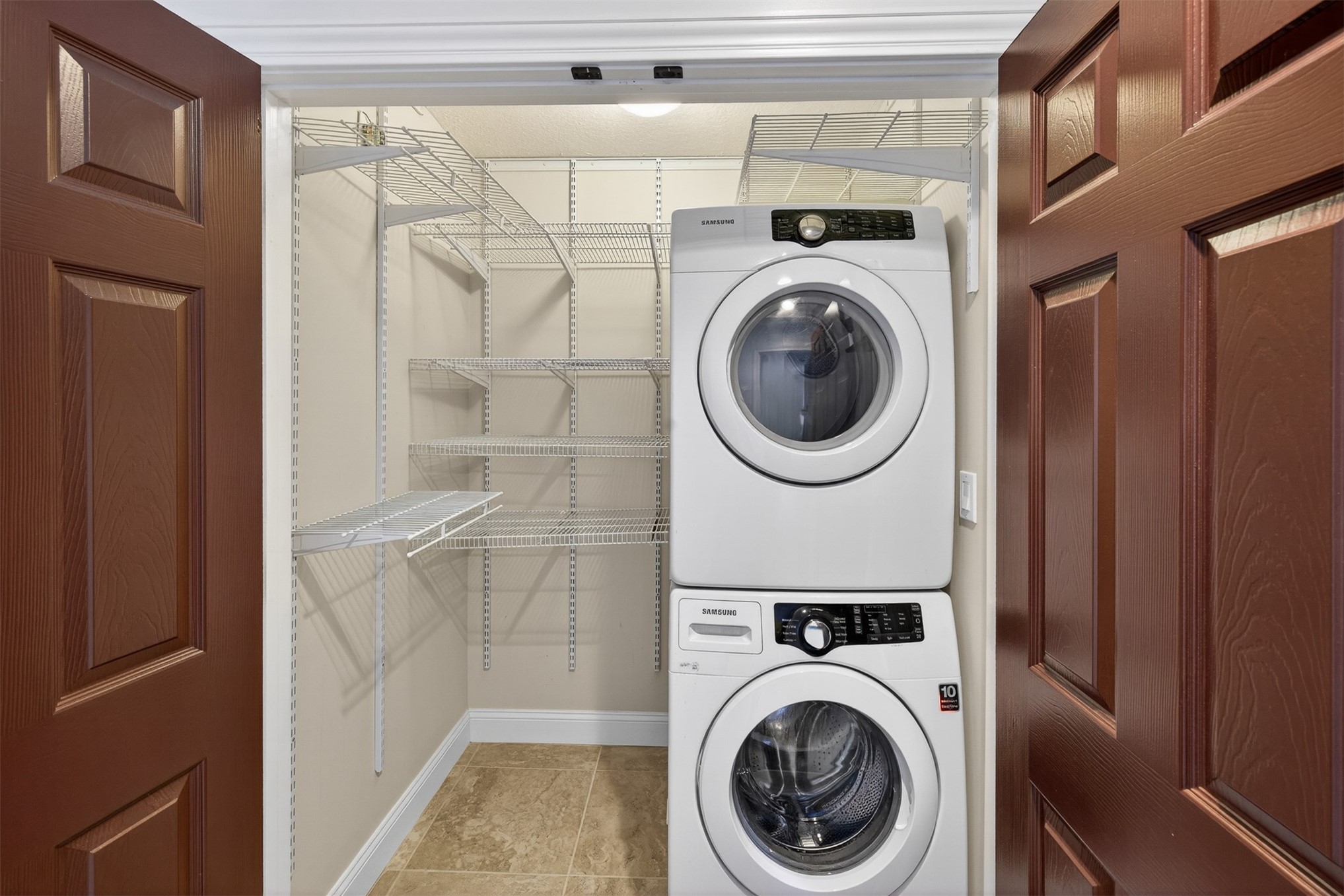 3301 Sea Marsh Road, Unit 3301 Amelia Island, FL 32034 - Photo 33 of 58 a utility room with dryer and washer