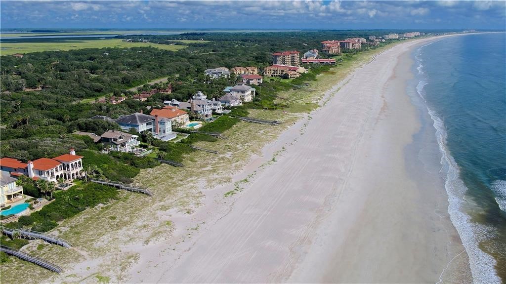 3301 Sea Marsh Road, Unit 3301 Amelia Island, FL 32034 - Photo 57 of 58 a view of a street with a park