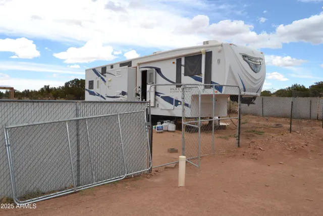a backyard of a house with seating space