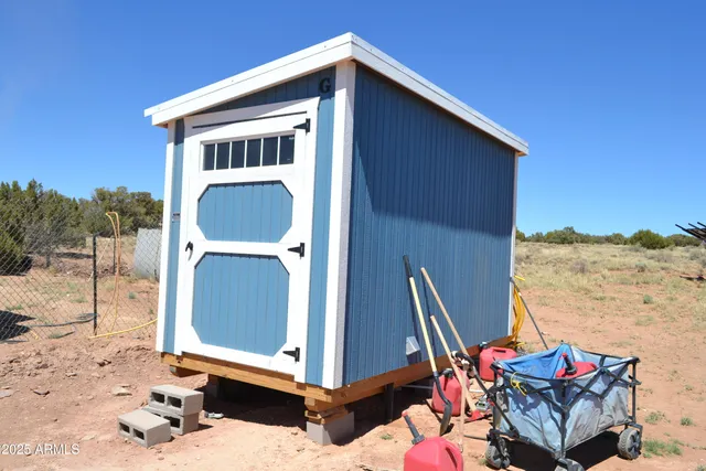 a view of a dry yard with mountain