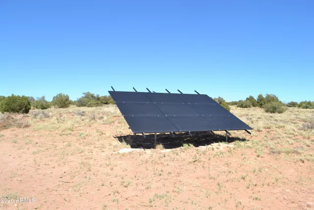 a view of a lake with a beach
