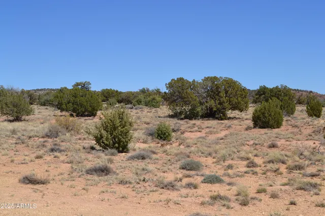 a view of a road with snow on the road