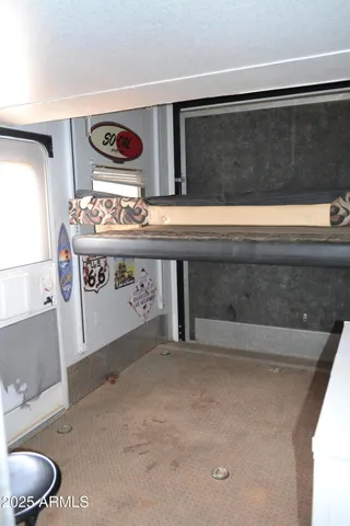a view of living room with washer and dryer