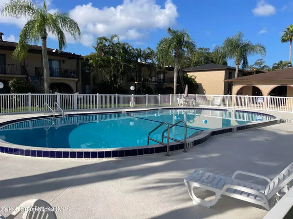 a view of outdoor space yard and swimming pool