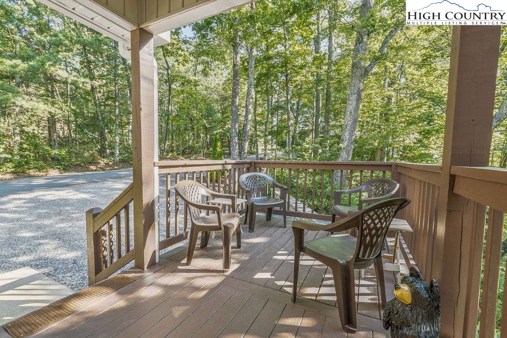 120 Ridge Road Newland, NC 28657 - Photo 28 of 40 a view of a chairs and table in the balcony