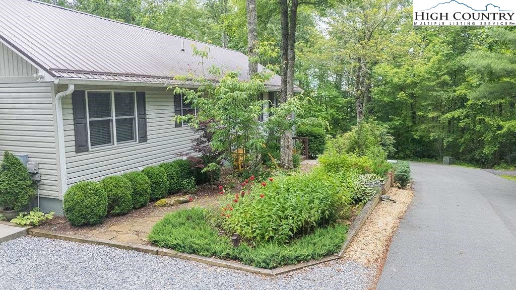 120 Ridge Road Newland, NC 28657 - Photo 37 of 40 a view of a house with lots of trees