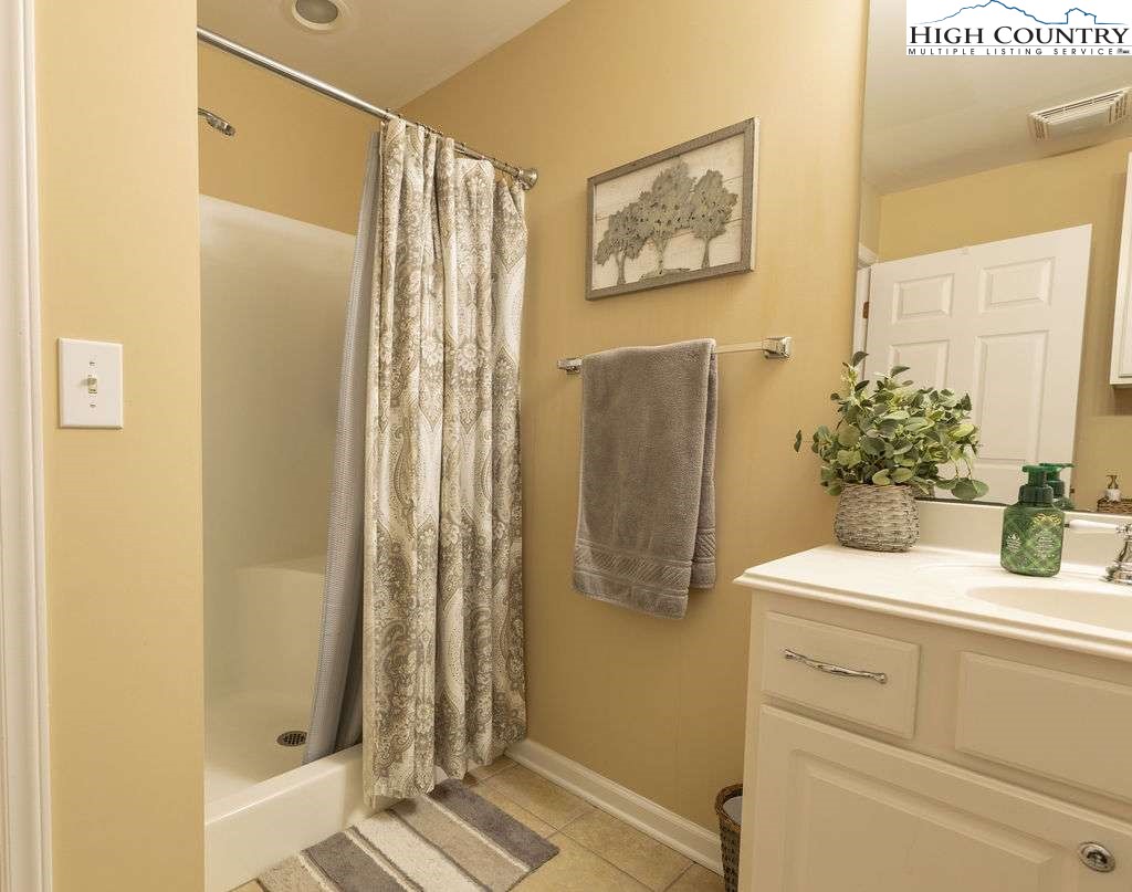 120 Ridge Road Newland, NC 28657 - Photo 7 of 40 a bathroom with a sink and a mirror