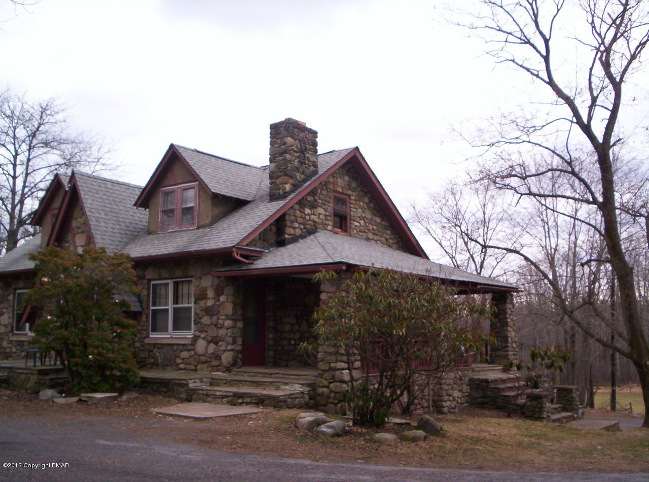 Grange Rd Mount Mount Pocono, PA 18344 - Photo 2 of 8 a front view of a house with garden