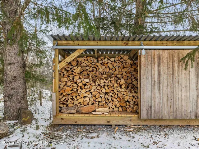 a view of staircase with railing and flowers