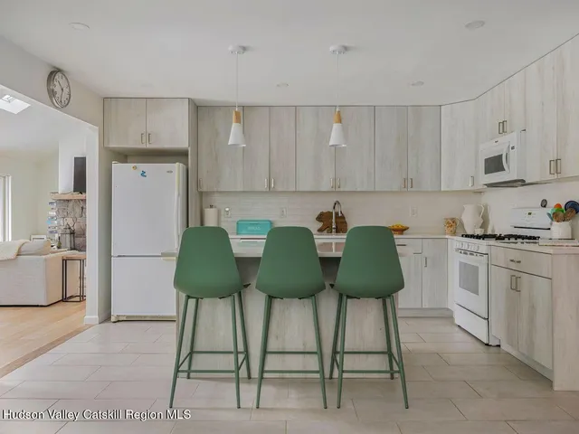 a view of kitchen and dining area