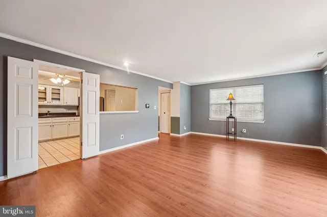 a bathroom with a sink vanity and mirror