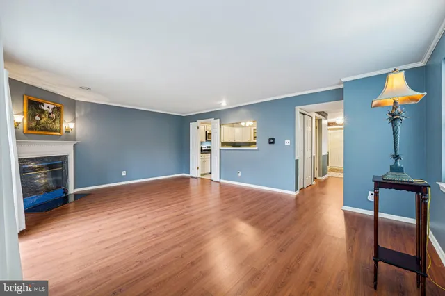 a bathroom with a tub a sink and a mirror