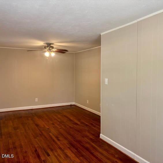1505 Old Ivey Road Apex, NC 27523 - Photo 4 of 10 a view of an empty room with wooden floor