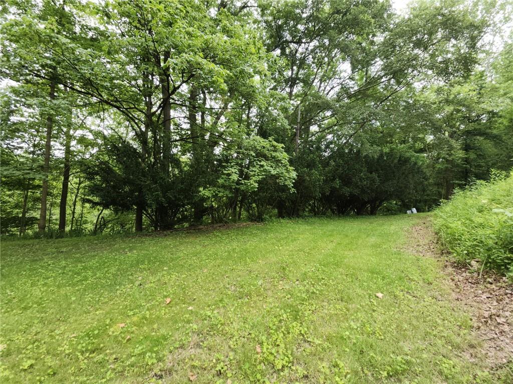 130 Keystone Road Herminie, PA 15637 - Photo 2 of 13 a view of a field of grass and trees