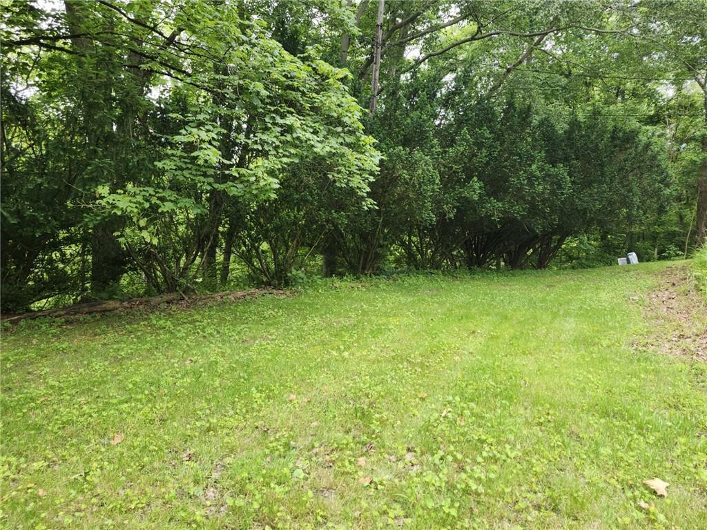 130 Keystone Road Herminie, PA 15637 - Photo 7 of 13 a view of a green yard