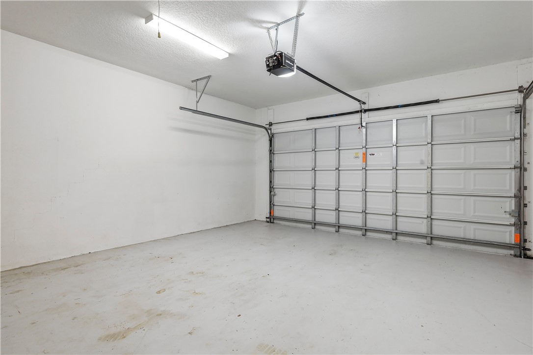 2030 Bridgepointe Circle, Unit 112 Vero Beach, FL 32967 - Photo 24 of 36 a view of a garage