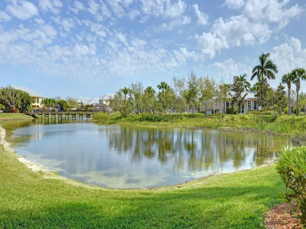 a view of a lake with a big yard