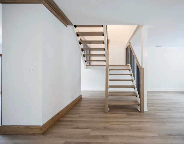 a view of entryway with wooden floor