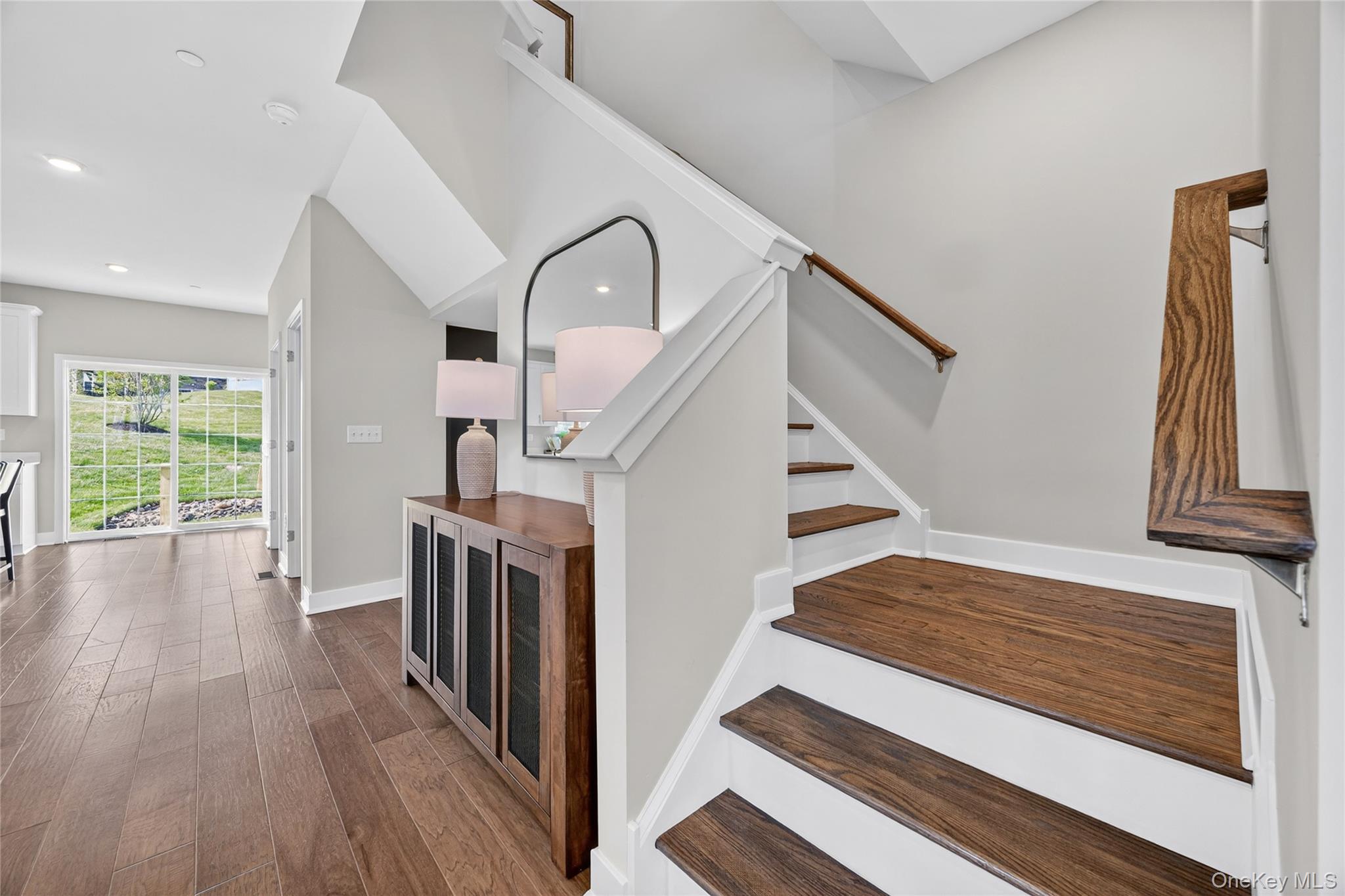 154 Pine Ridge Road Tuxedo Park, NY 10987 - Photo 11 of 25 a view of a livingroom with furniture wooden floor and staircase