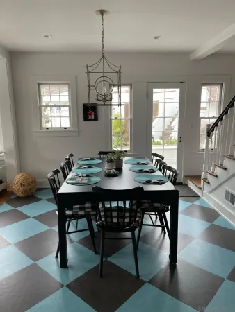 a view of a dining room with furniture