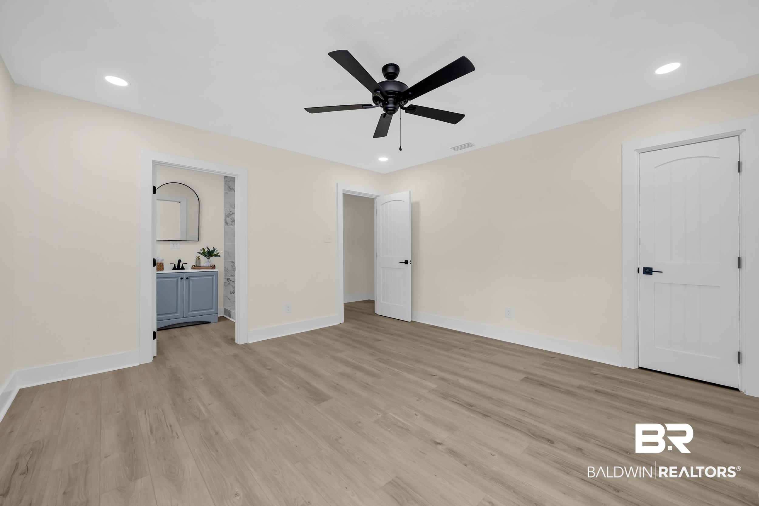 1409 Altair Lane Mobile, AL 36693 - Photo 11 of 23 Unfurnished bedroom featuring recessed lighting, ceiling fan, light wood-style flooring, and ensuite bathroom