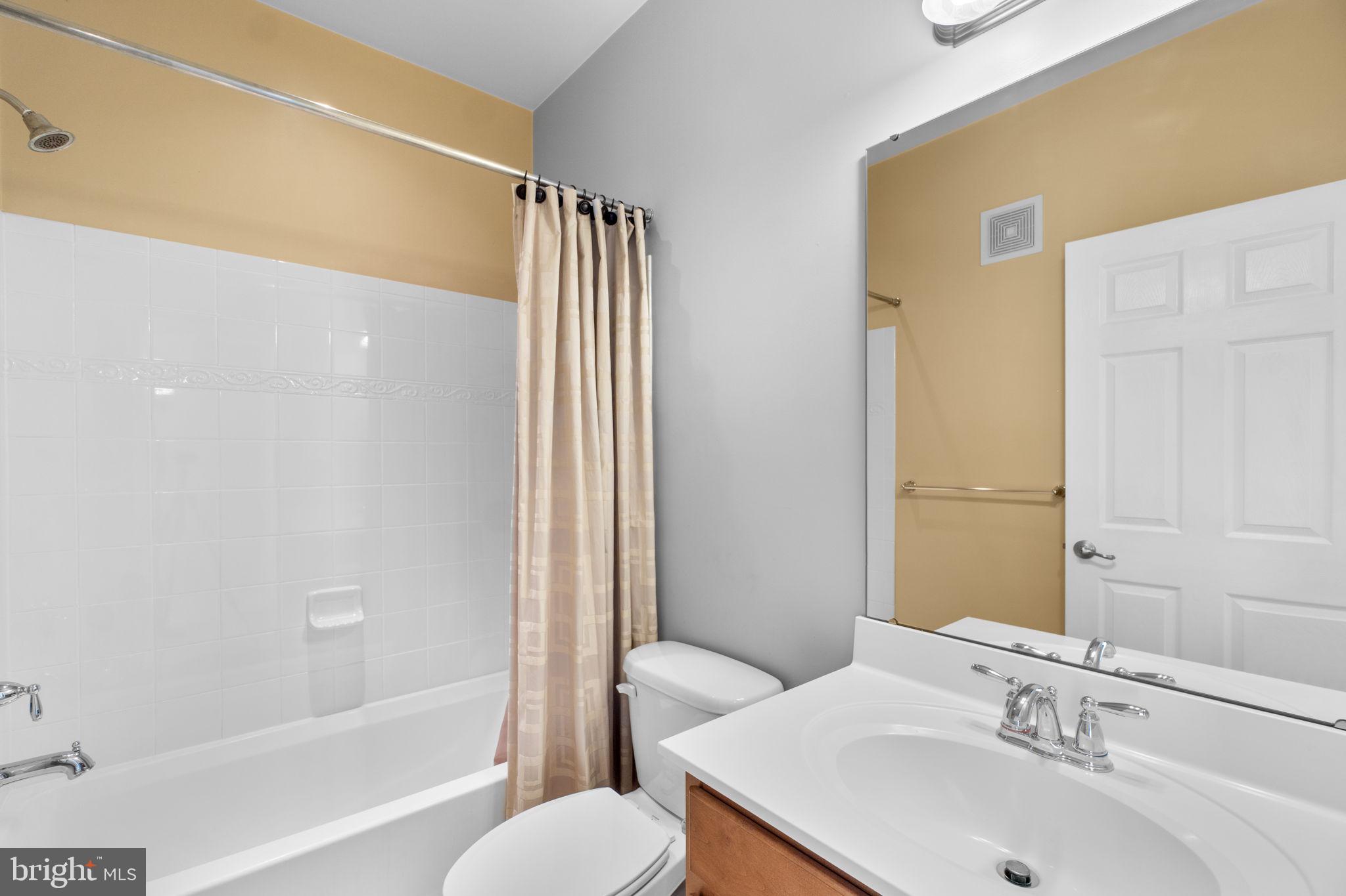 3624 Spring Hollow Lane Frederick, MD 21704 - Photo 21 of 46 a bathroom with a sink toilet and shower