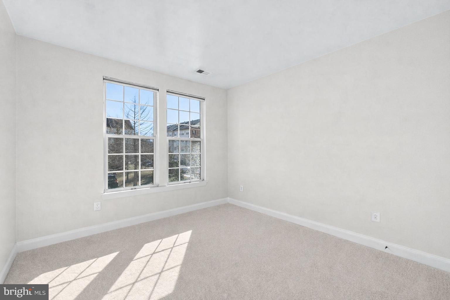 3624 Spring Hollow Lane Frederick, MD 21704 - Photo 22 of 46 a view of an empty room with a window