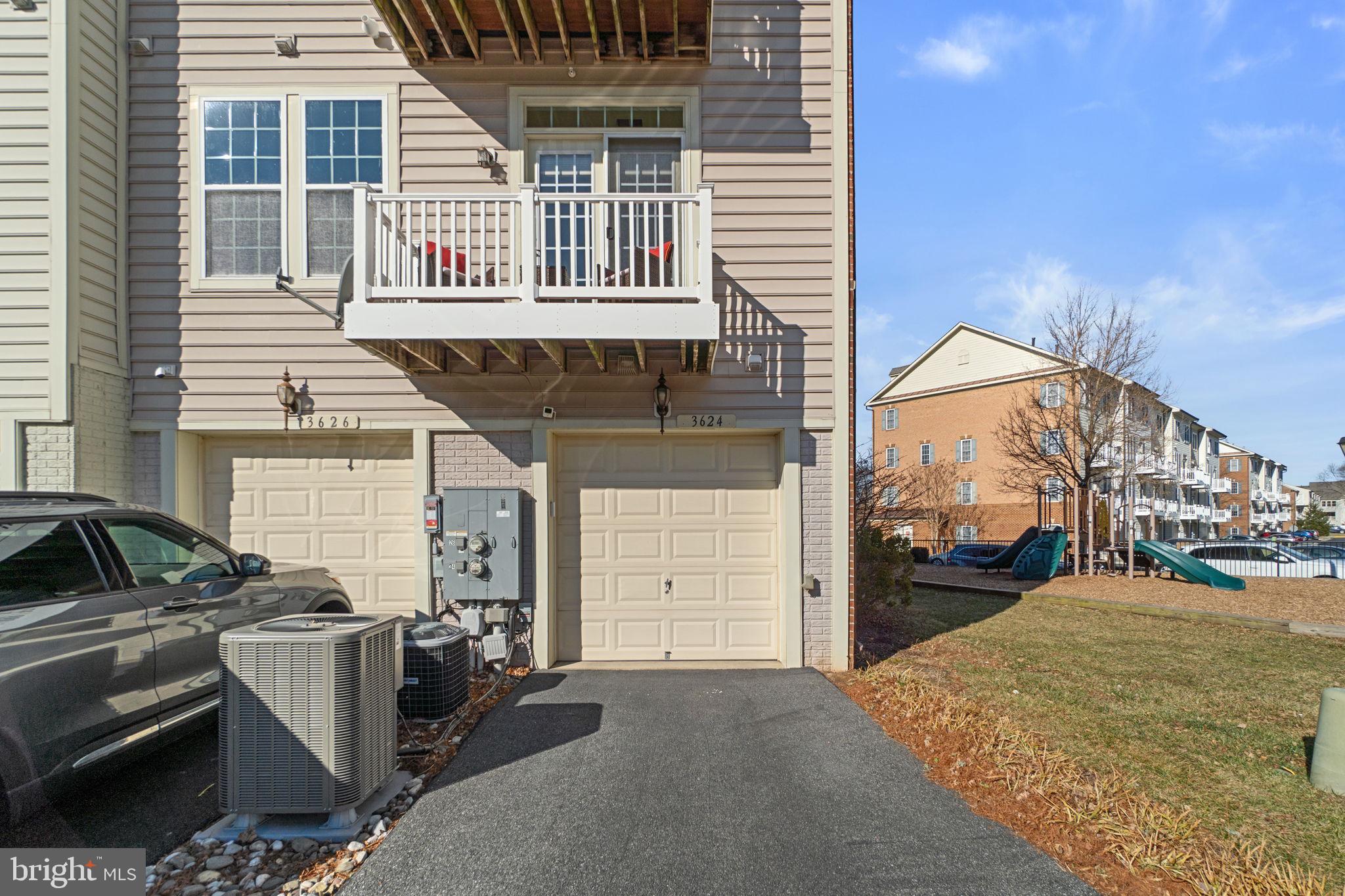 3624 Spring Hollow Lane Frederick, MD 21704 - Photo 29 of 46 a view of a patio with a table and chairs