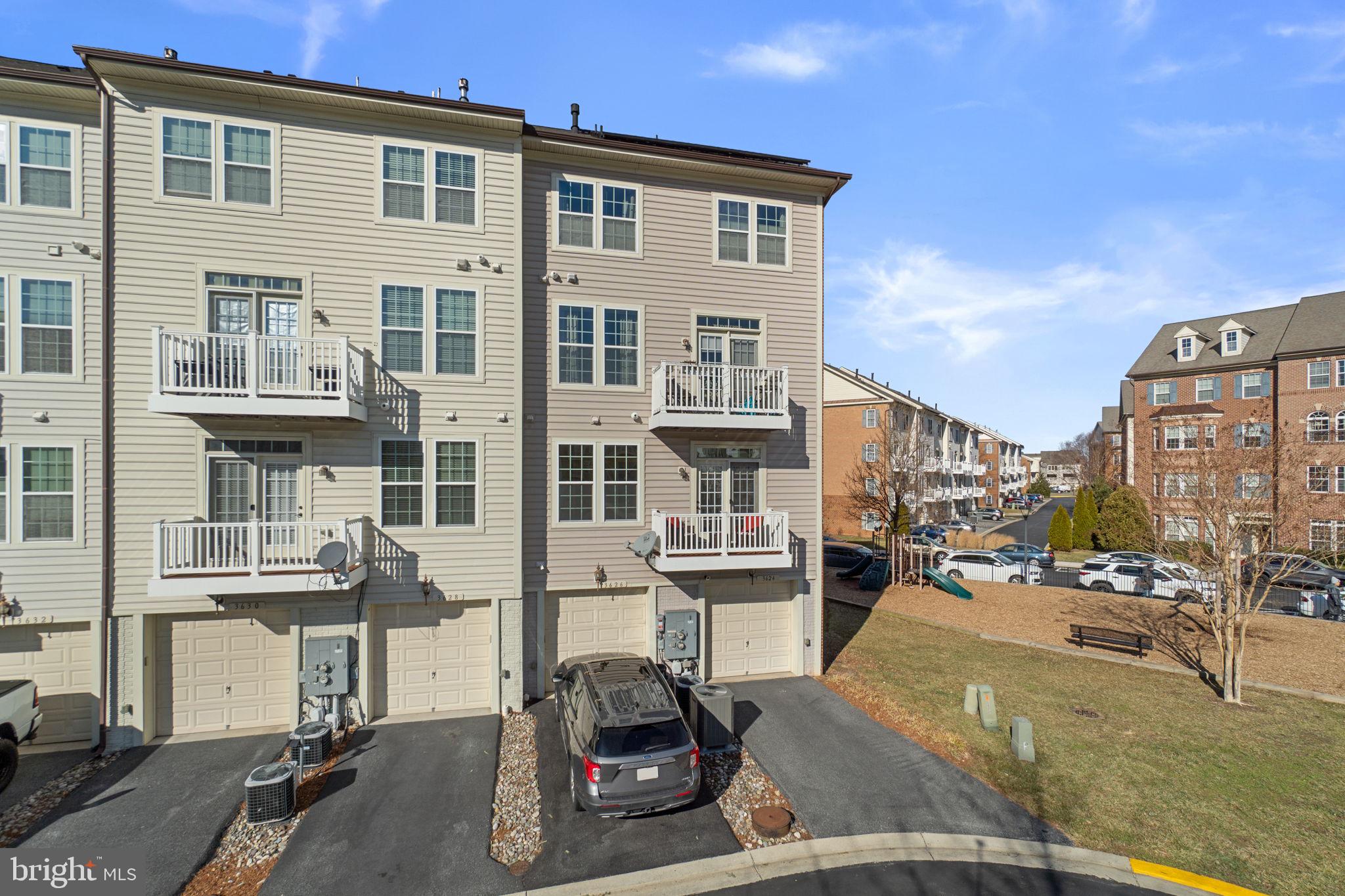 3624 Spring Hollow Lane Frederick, MD 21704 - Photo 30 of 46 a view of a building with many windows