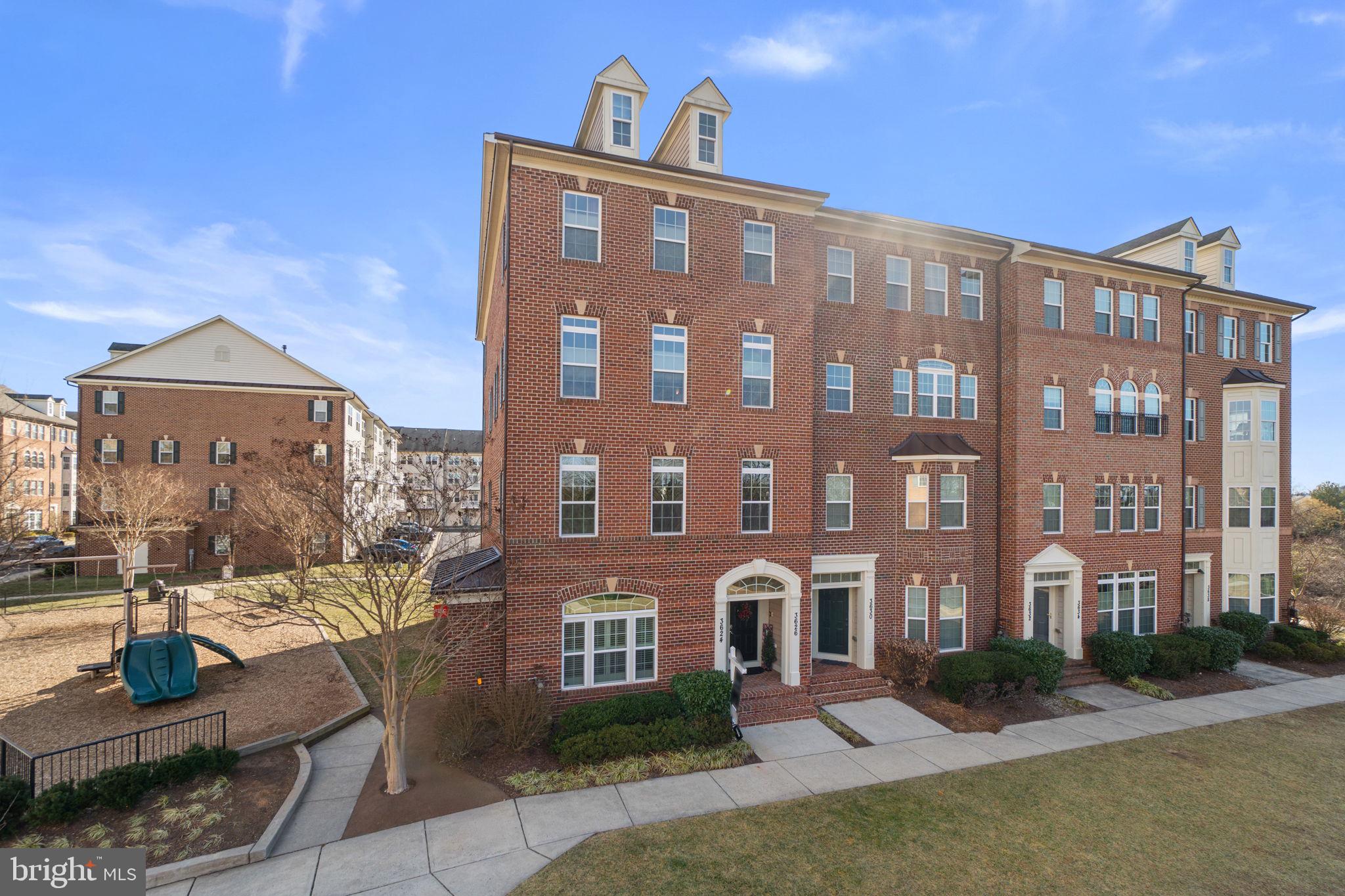 3624 Spring Hollow Lane Frederick, MD 21704 - Photo 3 of 46 a front view of a building with garden