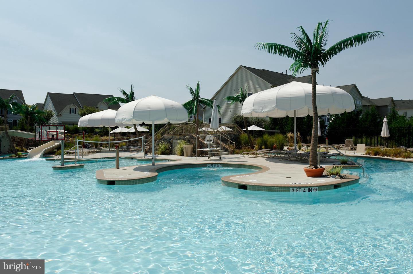 3624 Spring Hollow Lane Frederick, MD 21704 - Photo 34 of 46 a swimming pool with outdoor seating and yard