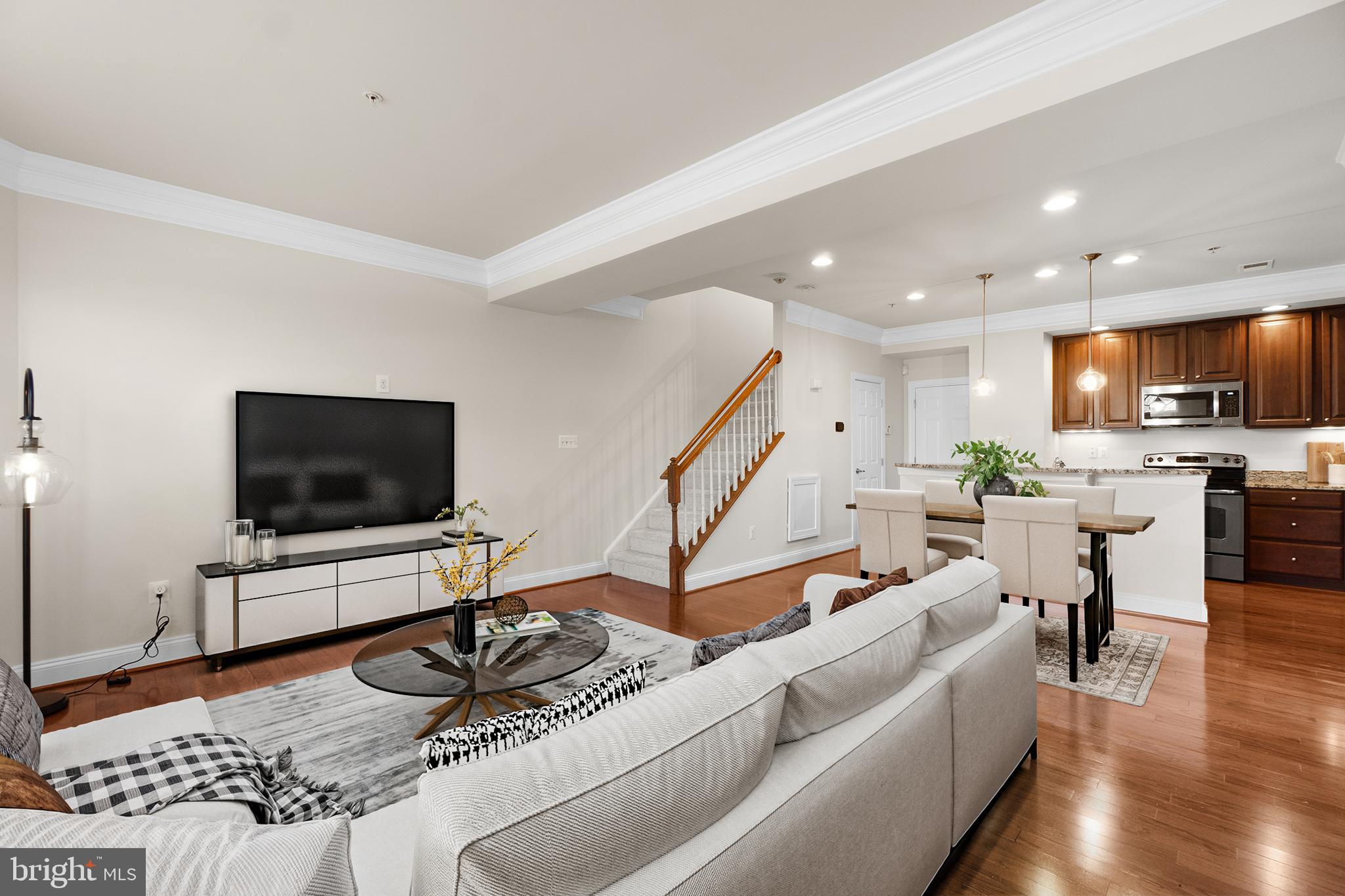 3624 Spring Hollow Lane Frederick, MD 21704 - Photo 5 of 46 a living room with furniture and a flat screen tv