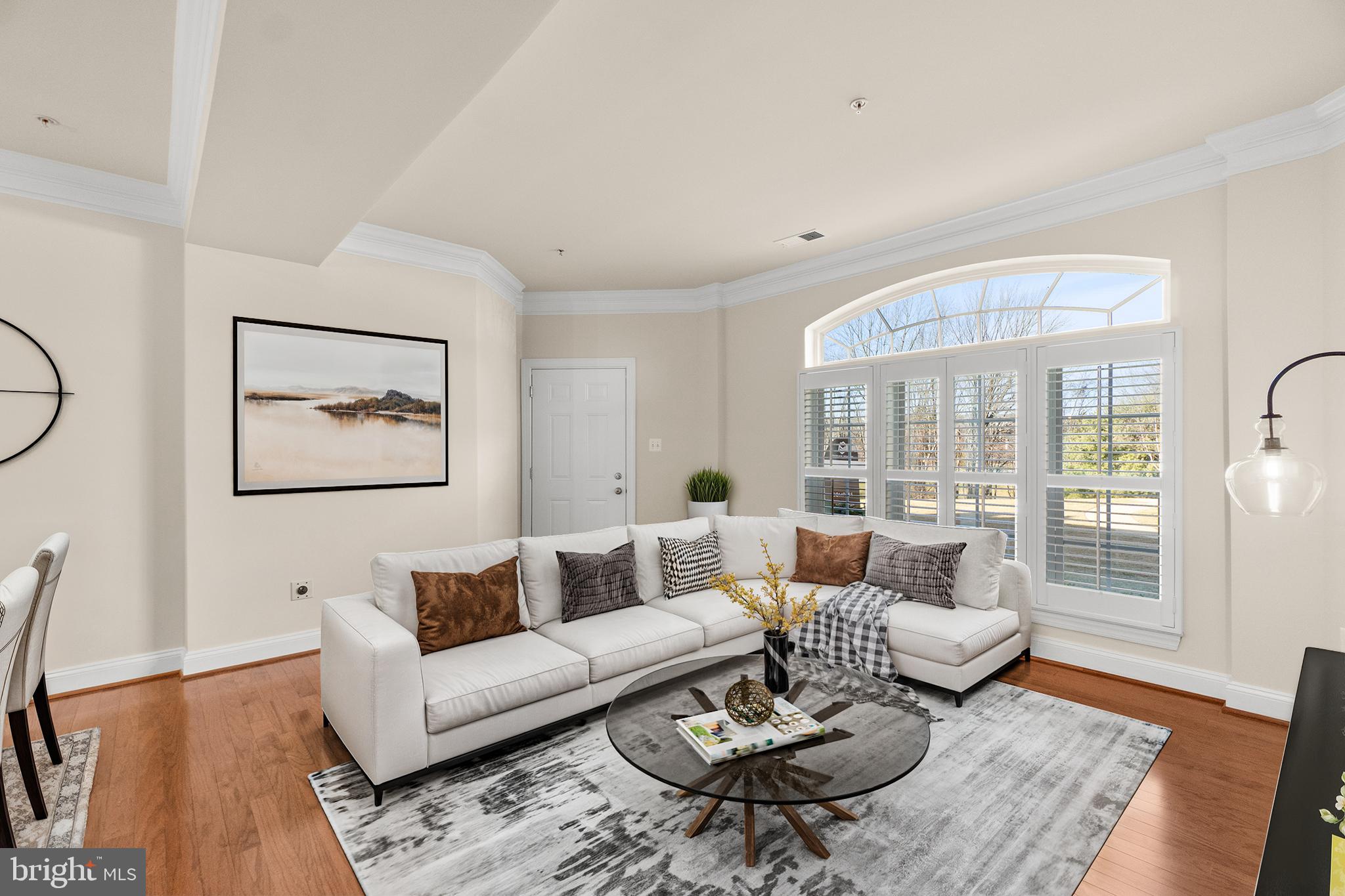 3624 Spring Hollow Lane Frederick, MD 21704 - Photo 9 of 46 a living room with furniture and wooden floor