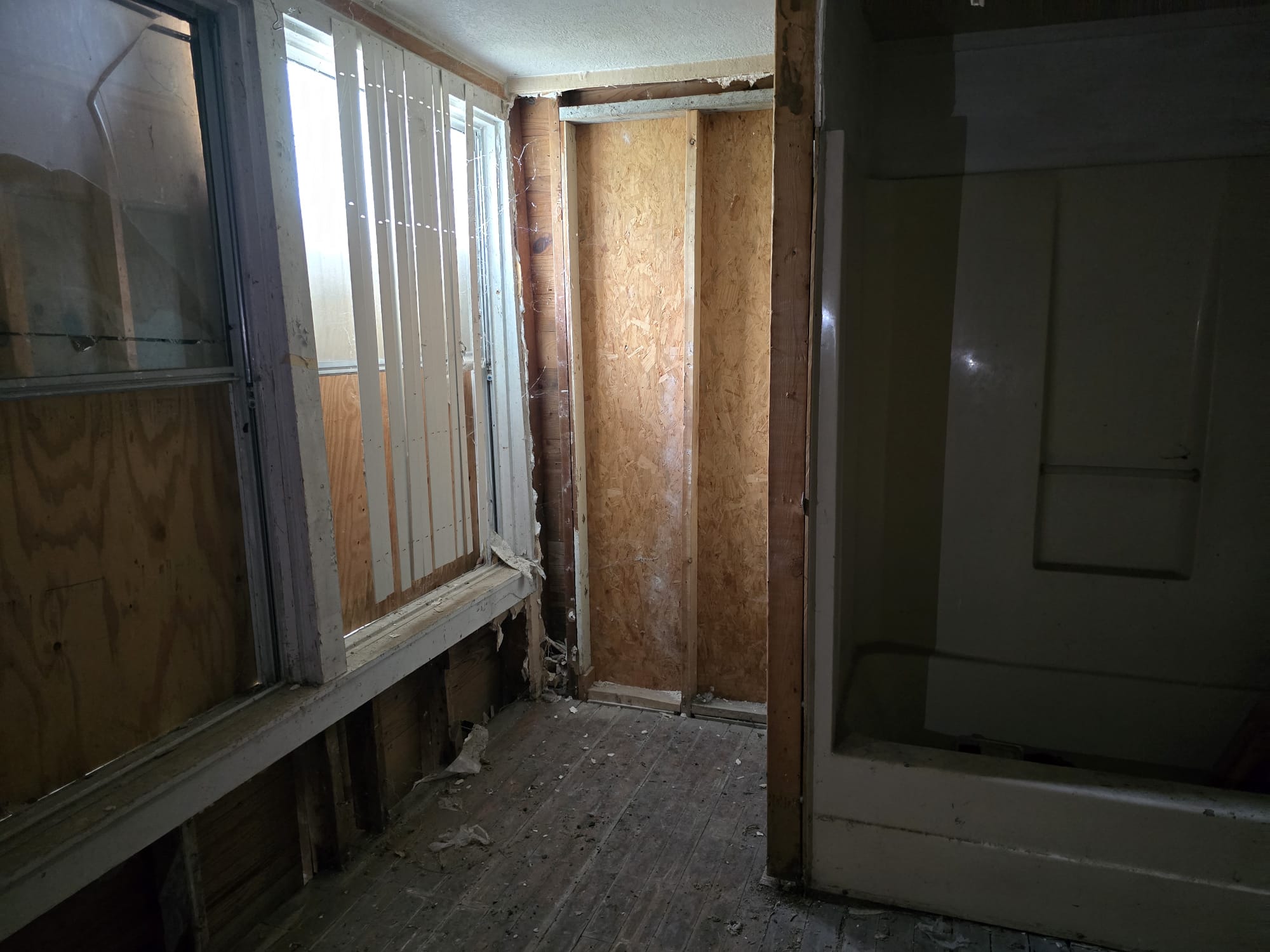 901 West 5th Street Taylor, TX 76574 - Photo 14 of 21 a bathroom with a shower and a sink