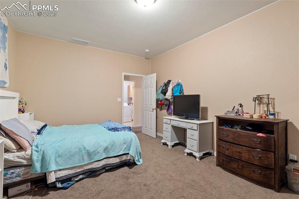 33 Riverdowns Colorado City, CO 81019 - Photo 37 of 45 a bedroom with a bed and a desk