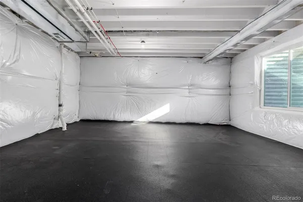 a view of a room with racks on the wall